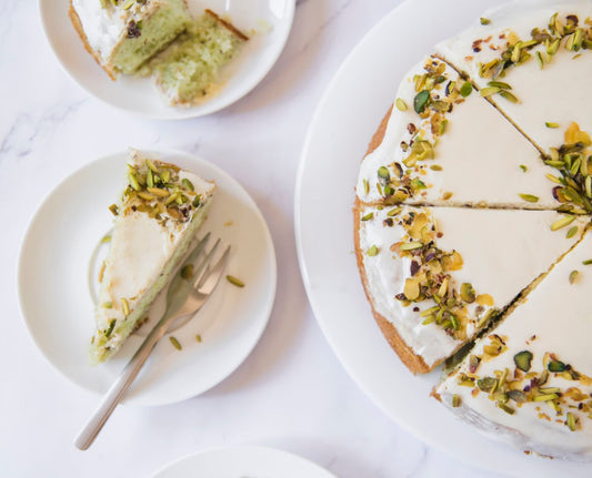 No-bake pistachio dessert — creamy pistachio cake slice topped with crushed pistachios