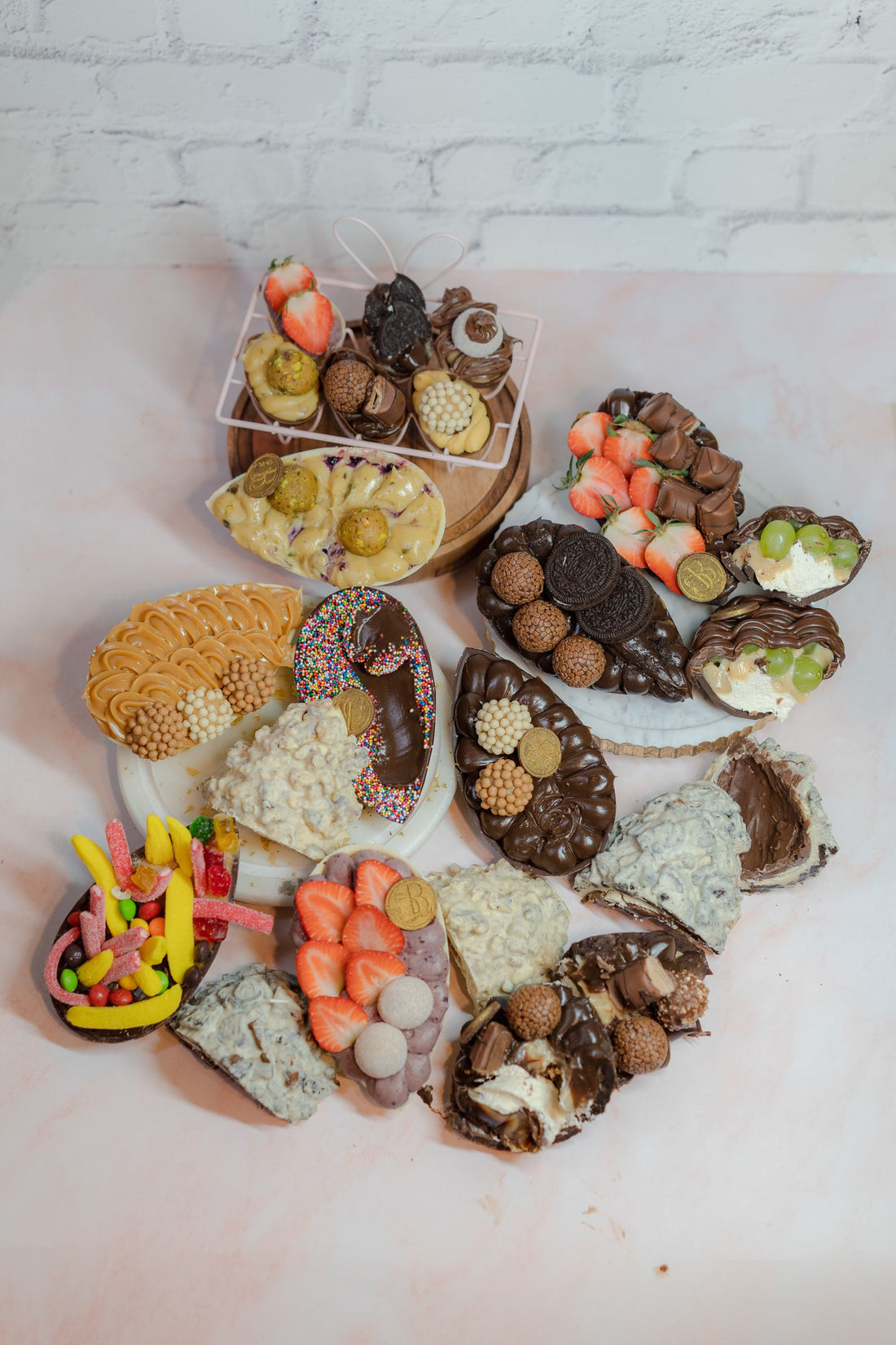 An indulgent array of chocolate desserts and toppings on a board — easy Friendsgiving dessert ideas that travel well