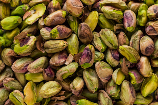Fresh green pistachio nuts — the star ingredient in pistachio cream spread recipes