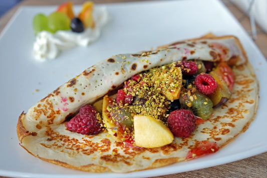 Pistachio dessert plate with cream and nuts — pistachio cream spread recipe inspiration